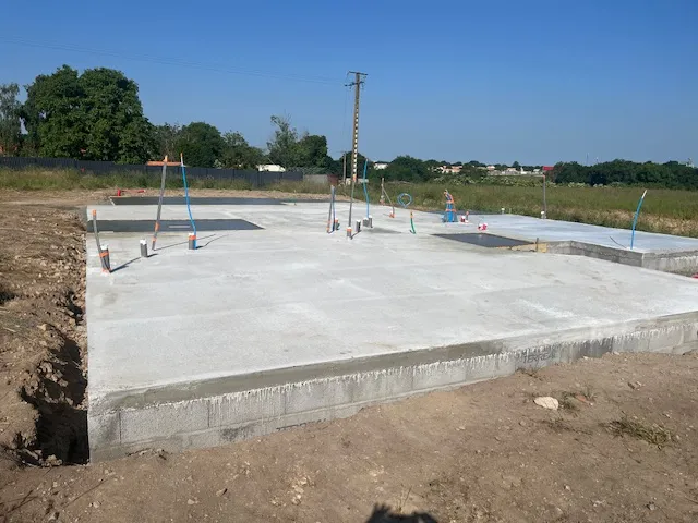 Coulage de la dalle pour une maison en ossature bois